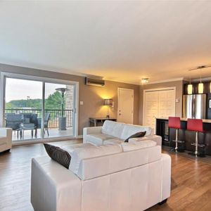 LE PRESTIGE À VAL-BÉLAIR | Splendide 5½ de 1500 pi² dans un rond-point - Photo 2
