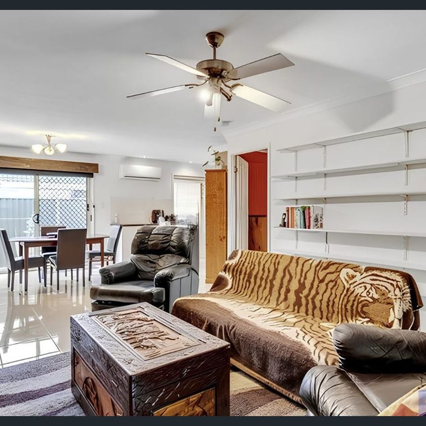 Low Maintenance Fully Fenced Property, Great Location, and Great Value! - Photo 1