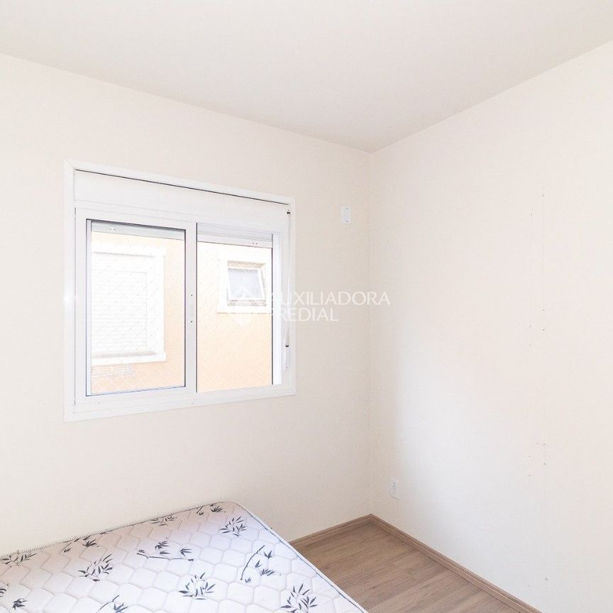 Casa em Condomínio com 2 quartos e 54m² para alugar em Ponta Grossa, Porto Alegre. - Photo 1