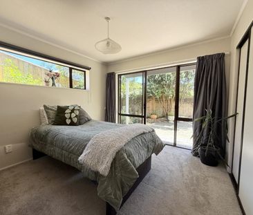 Modern Three-Bedroom Home with Sunroom and Stunning Views - Photo 3