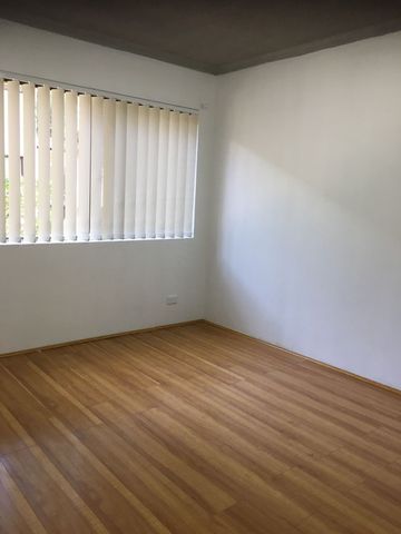 CONVENIENTLY LOCATED 2 BEDROOM UNIT - Photo 2