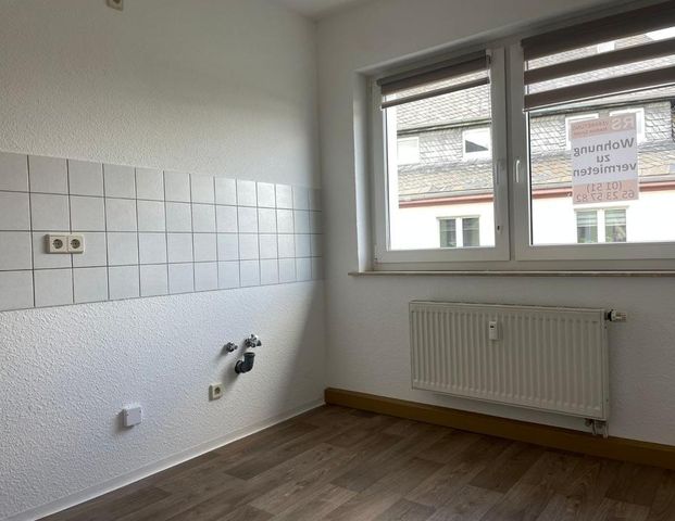 Gemütliche 2-Raum Wohnung in ruhiger Seitenstraße - Foto 1