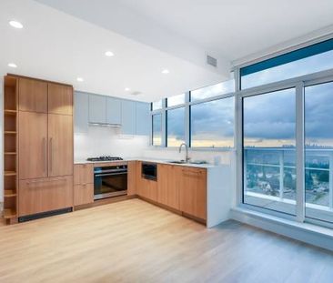 Luxury Sub-Penthouse | 2 Bed, 2 Bath + 2 Parking | Stunning Views - Photo 2