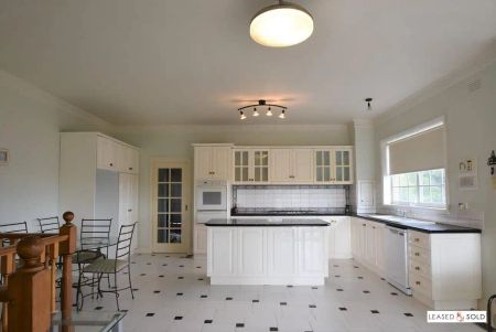 “Spacious Family Living with Dual Kitchens and Versatile Lower Level” - Photo 5