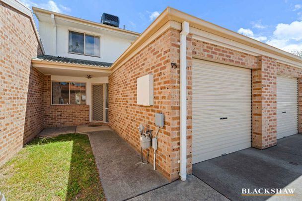 Stylish 3-Bedroom Townhouse with Golf Course Views & EV Charging - Photo 1