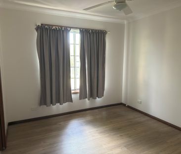 Coastal Comfort in a Quiet Duplex Setting - Photo 2