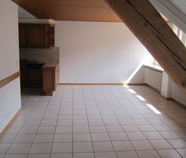 Appartement de 4 pièces au 3ème étage situé au centre du village - Photo 1
