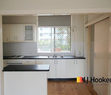 TWO BEDROOM APARTMENT IN PRIME LOCATION WITH A GLIMPSE OF WATER VIEWS! - Photo 4
