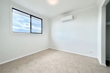 Brand-New, Effortless Modern Living in a Light-Filled Family Home - Photo 5