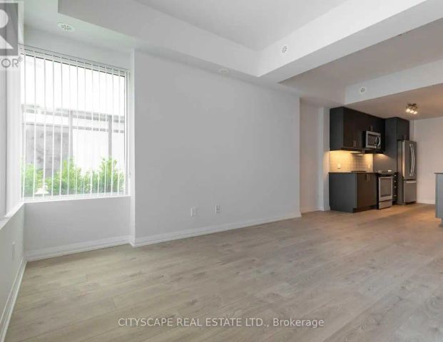 TH07 - 1010 PORTAGE PARKWAY — 4 Bedroom - Photo 1