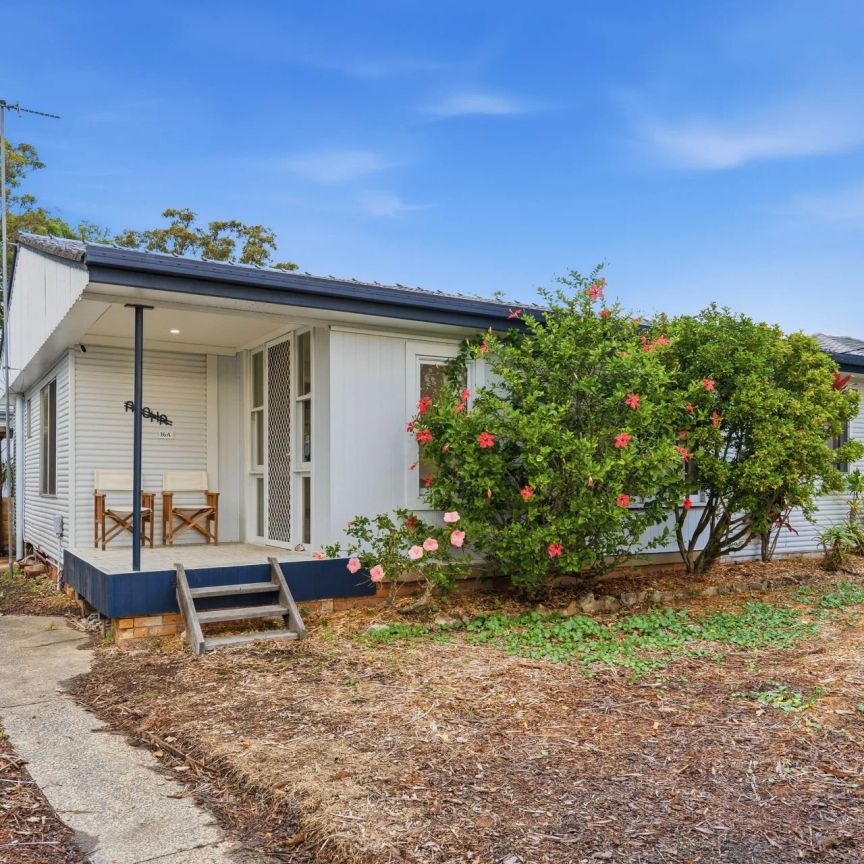 Coastal Comfort Meets Everyday Convenience - Water Usage Included in Lease ! - Photo 1