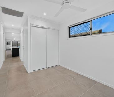 Brand New 4-Bedroom Home | Ducted Air, Solar & Multiple Living Areas - Photo 6