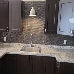 Logement situé a Grand Mere / TRES GRAND 4 1/2 Chauffée et Déneiger - Photo 2