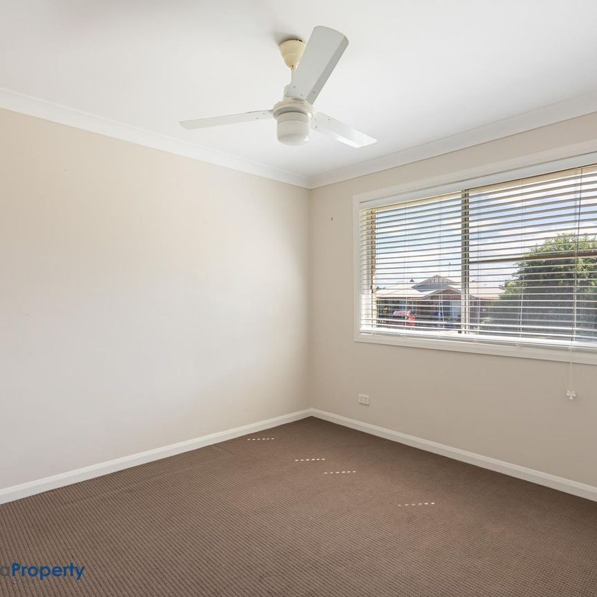 Spacious Family Living with Exceptional Shed Space and Outdoor Appeal - Photo 1
