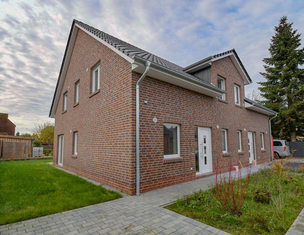 6654 - Energieeffizientes Wohnen im KfW-40-Standard: Ihr neues Zuhause erwartet Sie! - Foto 1