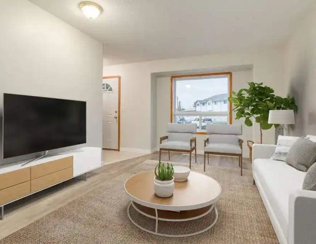 Halman Heights Townhomes — - 3 Bedroom - Photo 1