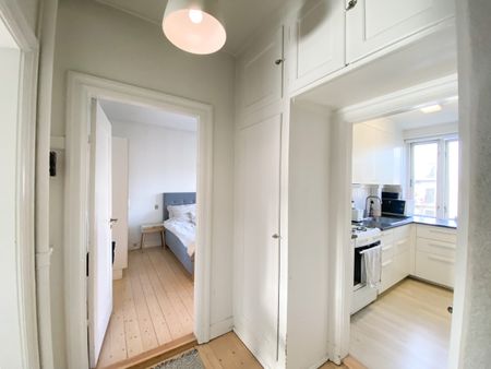 Lys og dejlig 2-værelses lejlighed med vestvendt altan - Foto 3