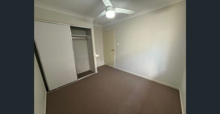 Stylish Lowset Home with New Carpets & Multiple Living Areas - Photo 3