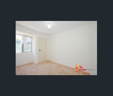 Spacious 4 Bedroom, 2 Bathroom Home in a Prime Location! - Photo 6