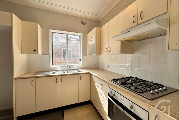 Family Comfort and Convenience in Prime Villawood Location! - Photo 1