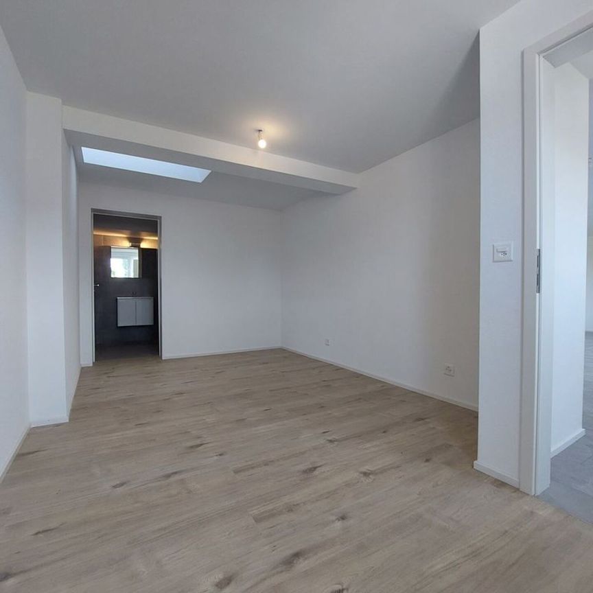 Appartement de 2,5 pièces au 2ème étage avec jardin commun - Photo 1