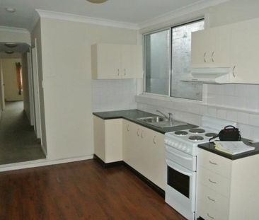 AFFORDABLE TWO BEDROOM UNIT IN PRIME LOCATION! - Photo 2