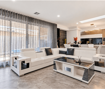 Light-Filled Luxury with Feature Fireplace, Skylight & Multiple Liv... - Photo 3