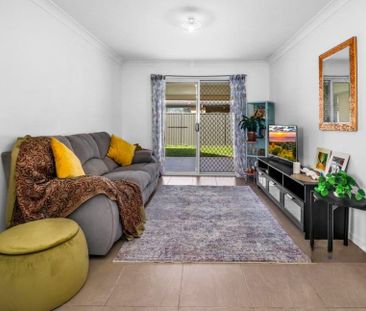 STUNNING FAMILY HOME WITH A BEAUTIFUL BACKYARD! - Photo 1