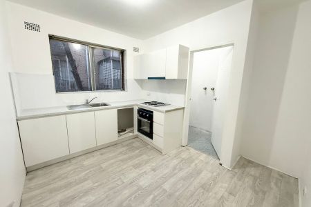 Spacious 2-Bedroom Unit with Renovated Kitchen & Timber Flooring - Photo 2
