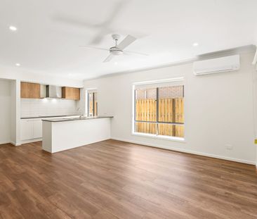 Modern Four-Bedroom Family Home with Separate Media Room - Photo 3