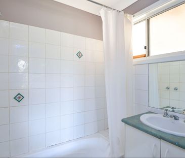 Neat & tidy brick home with large shed - Photo 3