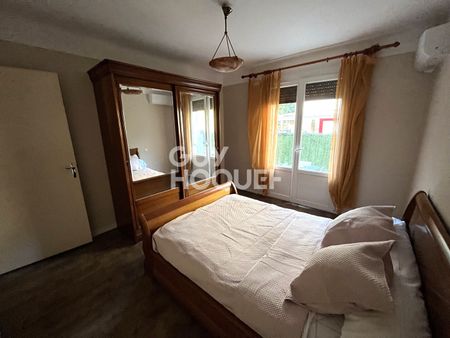 AMELIE LES BAINS PALALDA : appartement meublé F3 (61 m²) à louer avec garage et jardin - Photo 4