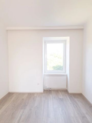Sanierte 4 Zimmer Wohnung im Haus mit einem großen Garten - Foto 5