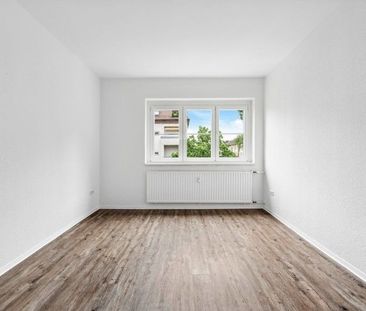 Frisch sanierte 2-Zimmer-Wohnung mit Wintergarten, Tiefgarage und A... - Foto 1