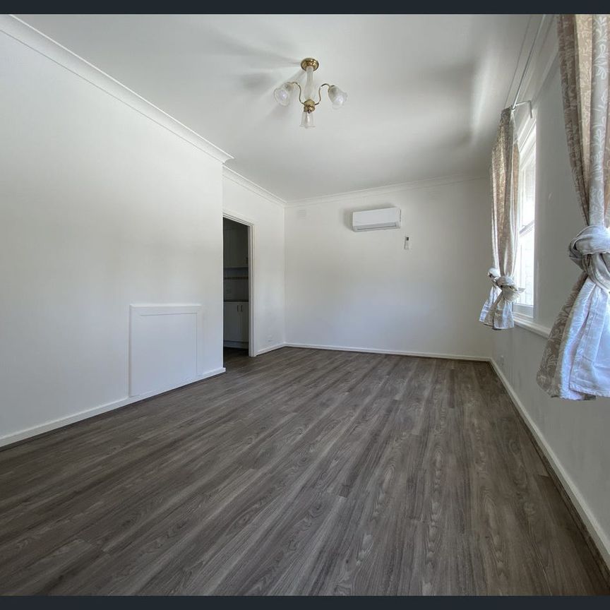 Renovated Family Home with Premium Security & Space - Photo 1