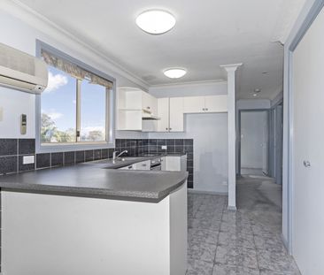 Neat 3 Bedroom Home - Photo 3