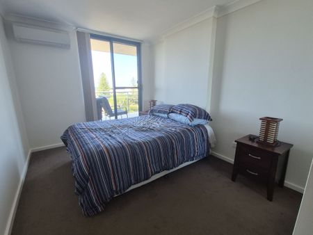 Immaculate Two-Bedroom Furnished Unit at the Entrance North - Photo 2