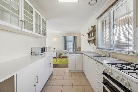 Comfortable Brick Home with Flexible Layout - Photo 3