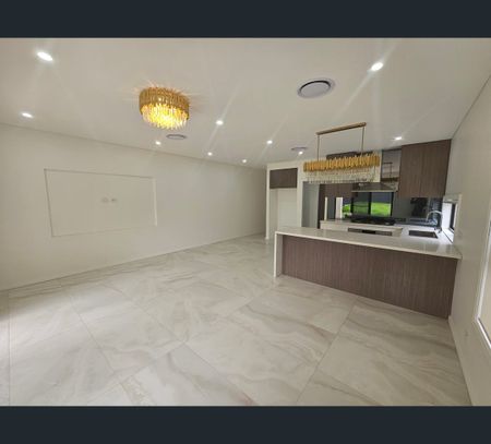 8 Bringelly Avenue, Pendle Hill, NSW 2145 - Photo 5