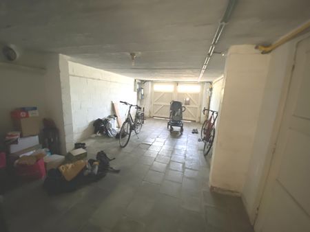 Gezellige rijwoning met garage en tuin in hartje Overijse - Foto 2