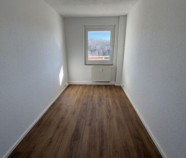 Zentral gelegene Vier-Raum-Wohnung mit Balkon - Foto 3