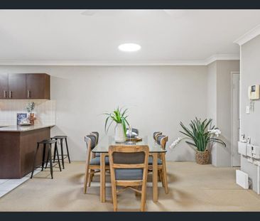 Sun-Drenched, Spacious & Convenient Living - Photo 2