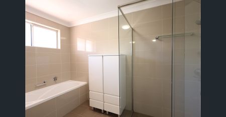 Spacious 3-Bedroom Townhouse in the Heart of Kirrawee - Photo 4