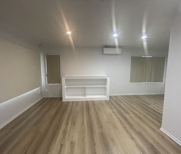 Fully renovated single level 4 Bedroom home - Photo 4