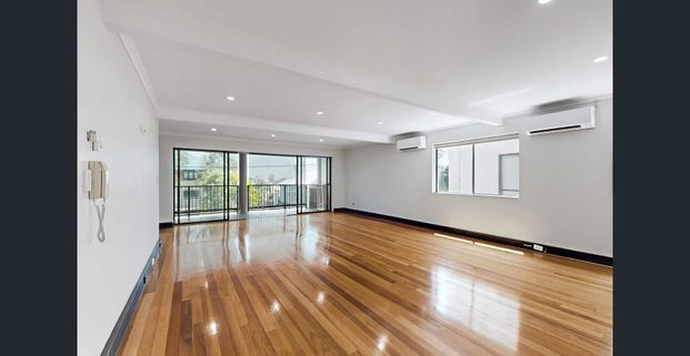 Two bedrooms. Two levels. One seriously convenient location. - Photo 1