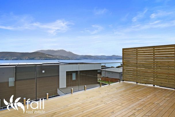 Stylish Three Level Home with Stunning River and Mountain Views in Tranmere - Photo 1