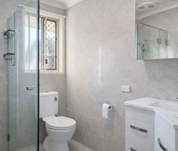 Spacious 4-Bedroom Family Home with Air-Conditioning Throughout - Photo 5