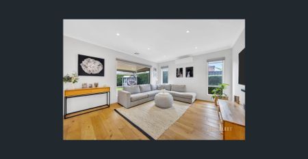 Spacious 4-Bedroom Home with Multiple Living Zones - Photo 3