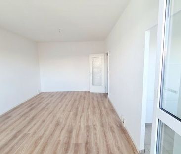 Sanierte Familienwohnung mit Balkon und Aufzug wartet auf Sie! - Foto 1