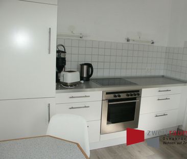 Wüste, modern möblierte Dachgeschosswohnung, fußnah zur City gelegen. - Photo 1